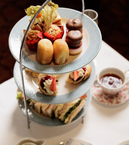 Afternoon tea with pastries and sandwiches at Springfield Hotel.