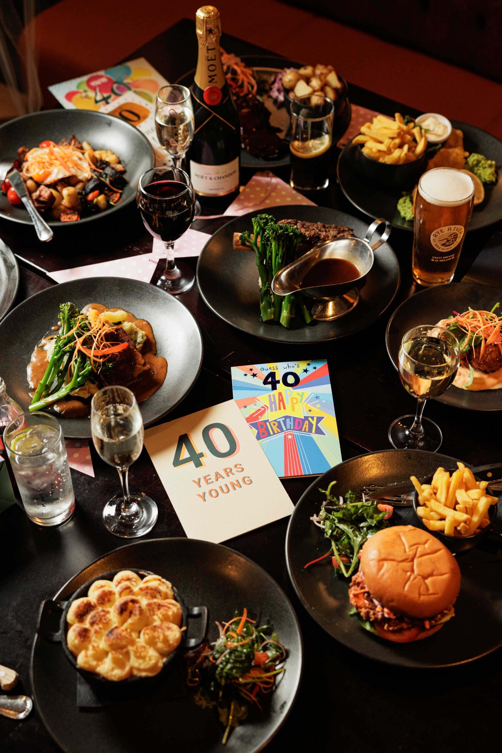 A table with celebratory food and drinks set up for a 40th birthday at Springfield Hotel.