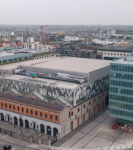 Urban view of Springfield Hotel with modern architecture amidst cityscape.