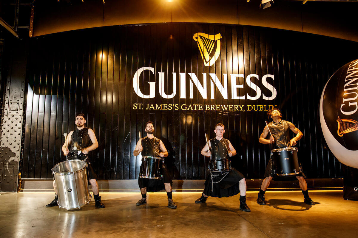 Family enjoying lively drum performance at a Springfield hotel