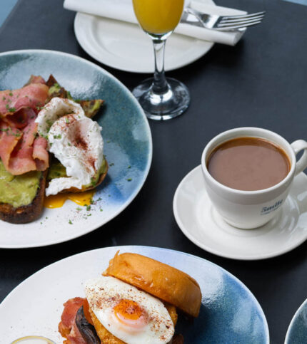A hearty breakfast spread with eggs, toast, coffee, and juice at Springfield Hotel restaurant.